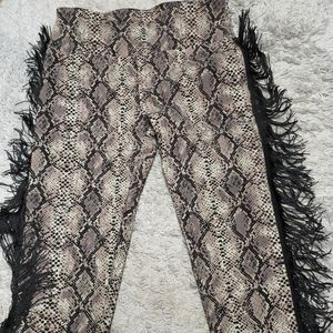 Snakeskin pant with tassel. Stretchy. Pull on